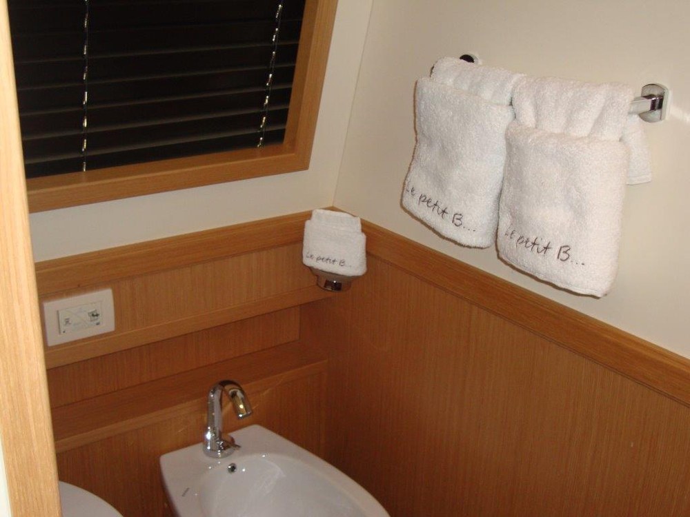 Personalised towels embroidered for a private yacht's bathroom